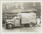 Model T16 B K 39; William Mantia Fruit Co. truck with two people loading
