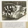 Hollywood actresses in Buick coupe.