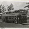 72 Passenger Double Deck Coach - Model 720 - Chicago Motor Coach Company with passengers boarding.