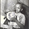 Harlem Community Art Center: student in metal craft class, 290 Lenox Avenue