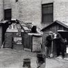 Huts and unemployed, West Houston and Mercer Street, Manhattan.