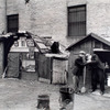 Huts and unemployed, West Houston and Mercer Street