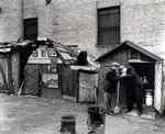 Huts and unemployed, West Houston and Mercer Street