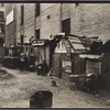 Huts and unemployed, West Houston and Mercer St., Manhattan.