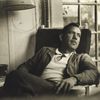 J. Steinbeck, sitting on a chair