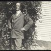 Percival Pollard (in front of a bush)