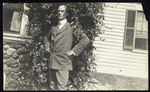 Percival Pollard (in front of a bush)