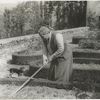 Gertrude Stein at the formal garden of her villa at Bilignin, with Pepe