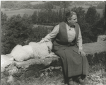 Gertrude Stein at Bilignin, on the terrace with Basket I, June 13, 1934.