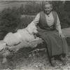 Gertrude Stein, with Basket I, on the terrace of the villa at Bilignin