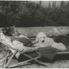Gertrude Stein with Basket and Pepe on the terrace of the villa at Bilignin