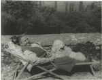 Gertrude Stein, with Basket I and Pepe, on the terrace of the villa at Bilignin