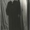 Gertrude Stein in the robe she wore during her lecture tour in America. This series of pictures made at Carl Van Vechten's apartment 7D 150 W. 55 St. November 4, 1934.