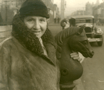 Gertrude Stein, Richmond, Virginia. With an old hitching post. February 7, 1935.