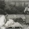 Gertrude Stein with Pepe ; Mark Lutz with Basket I on the terrace of the villa at Bilignim