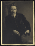 Robert L. Stevenson in velvet jacket with smoking cap
