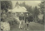 Hugh Walpole (right, with a newspaper) and Carl Van Vechten, at H. Walpole's residence "Brackenburn"