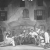 Scene "courtyard: Catfish Row, Charleston, S.C." designed by Cleon Throckmorton for "Porgy" original production. NYC: Guild Theatre, 1927. [Rose Macclendon, Evelyn Ellis, Percy Verwayne, Frank Wilson, et al.]