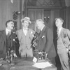 L to R: ?? , Osgood Perkins (Walter Burns), George Barbier (Mayor) and Lee Tracy (Hildy Johnson, Herald-Examiner).