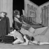 George Gaul as Faust (standing), Dudley Digges (Mephistopheles) et al. in the Theatre Guild's production of "Faust", 1928.