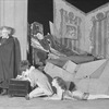 George Gaul as Faust (standing), Dudley Digges (Mephistopheles) et al. in the Theatre Guild's production of "Faust", 1928.