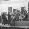 Jay Mondaaye as King of Babylon (seated on throne).