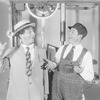 Joe Cook as Joe Squibb and Dave Chasen as Wiffington in Fine and Dandy.