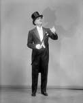 Frank Morgan (in tuxedo, with top hat and a stick) in The Band Wagon