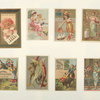 Trade cards depicting toys, women, a donkey, a mask, a kimono, a jar of meat, a parasol, a frog, shellfish and children : playing with a cat, pointing at something on the beach, holding a drawing and being lifted onto and falling off of a donkey.