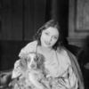 Katharine Cornell as Elizabeth Barrett and "Flush" (cocker Spaniel).