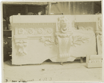 Plaster model of architectural decoration to go above a window, including moldings, a keystone decorated with a volute, and a lion's head