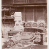 Plaster models of a Corinthian capital and four versions of tympanum relief sculpture