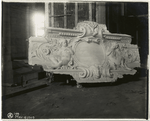 Plaster model of a panel decorated with two cherubs and foliage