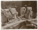 Exterior marble work : two workers