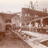 Interior work : workers laying bricks