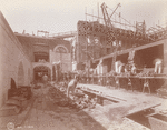Interior work : workers laying bricks