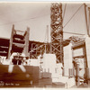 Interior work, Astor Hall : construction of walls and an arch