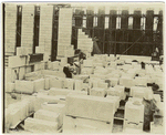 Interior work : marble blocks, and construction of west wall