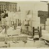 Interior work : marble blocks and construction of walls, facing northeast