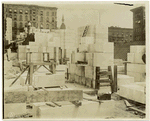 Interior work : marble blocks and construction of walls, facing northeast