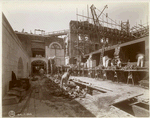 Interior work : workers laying bricks