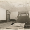 Interior work : room with a completed doorway and partially completed ceiling