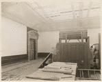 Interior work : room with a completed doorway and partially completed ceiling