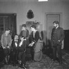 The Stokmann family "at home". Walter Hampden (Dr. Stockmann), Mabel Moore (Mrs. Stockmann), C. Norman Hammond as Peter Stockmann, extreme right, appearing in "An enemy of the people", NYC: Hampden Theatre.