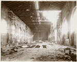 Interior work : construction of the Main Reading Room, showing a section of the framework of the floor