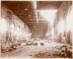 Interior work : construction of the Main Reading Room, showing a section of the framework of the floor
