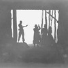 Charles S. Gilpin as Jones fires at the auctioneer and the planter. (Scene 5.)
