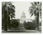 State capitol and grounds, with palm trees in foreground, Sacramento, California.