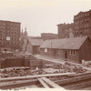 Foundation work : workers laying bricks, looking northeast