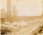 Foundation work : initial construction of exterior marble walls, northwest corner